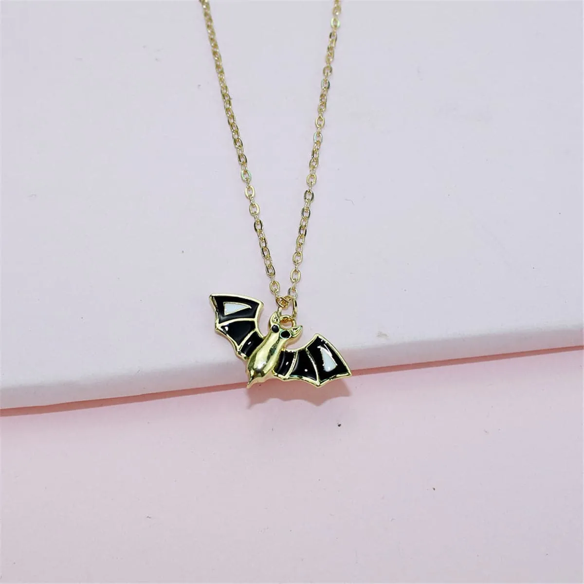 Black & 18K Gold-Plated Bat Pendant Necklace & Drop Earrings