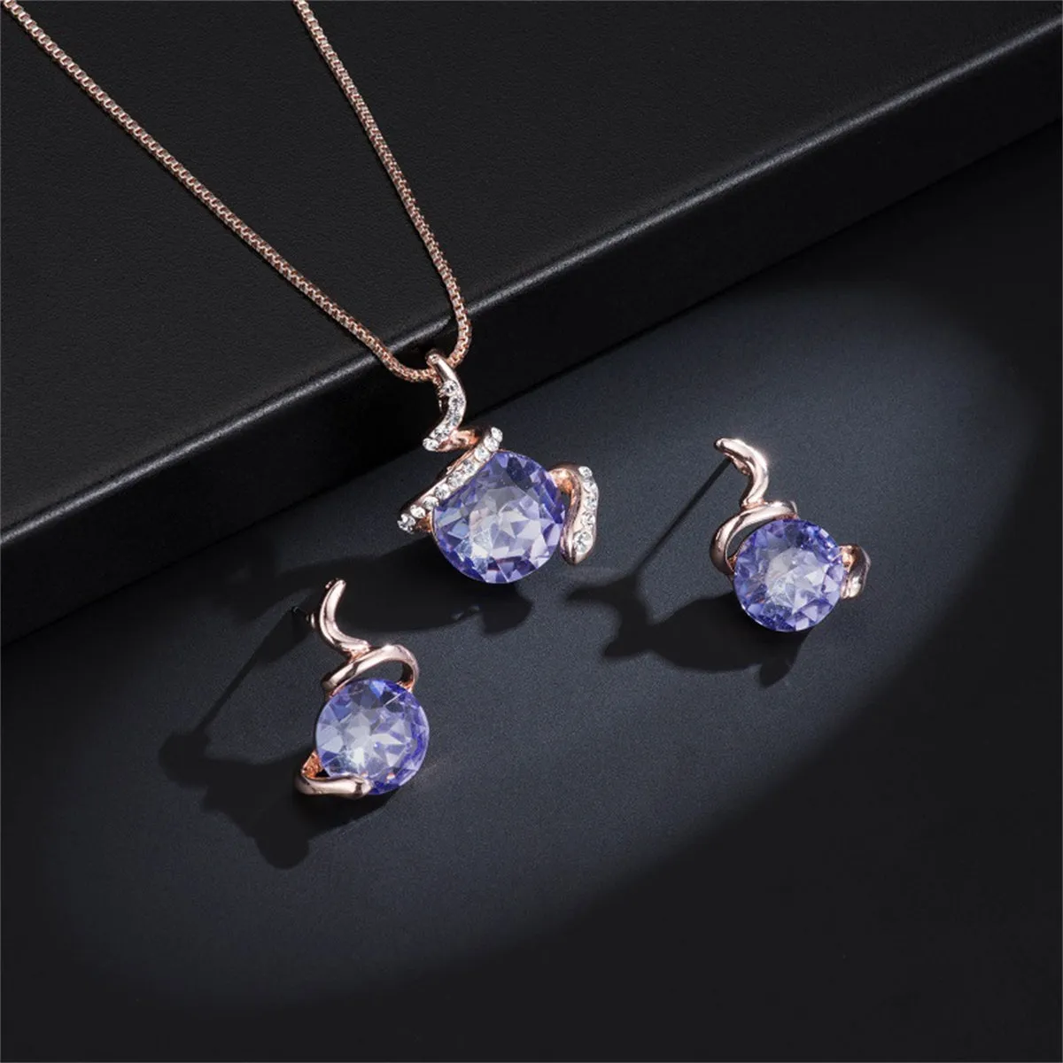 Purple Crystal & Cubic Zirconia Swirl Earring & Necklace