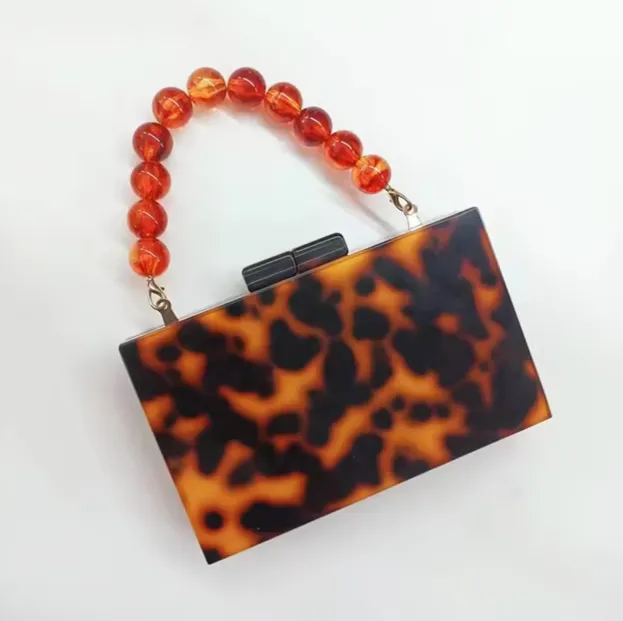 Sculptural Beaded Handle Clutch