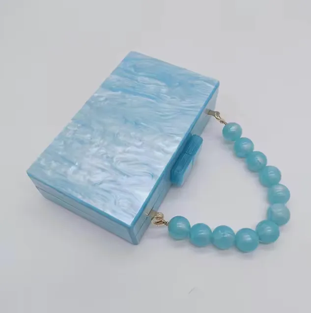 Sculptural Beaded Handle Clutch