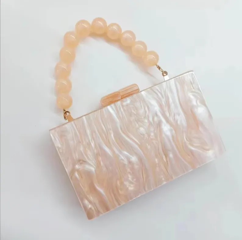 Sculptural Beaded Handle Clutch