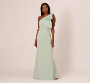 Stretch Crepe One Shoulder Mermaid Gown With Bow Accent In Icy Sage